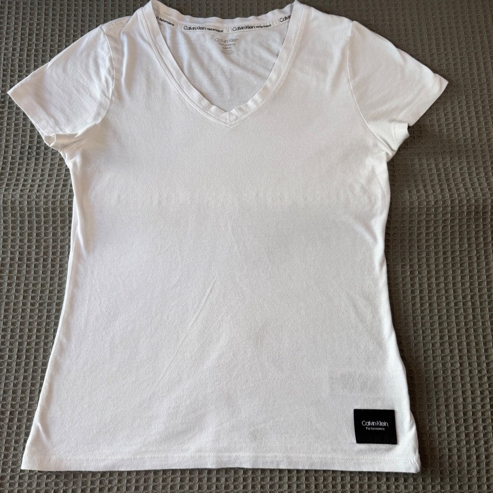 Calvin Klein Performance Womens White V-Neck Short Sleeve T-Shirt Size S Patch